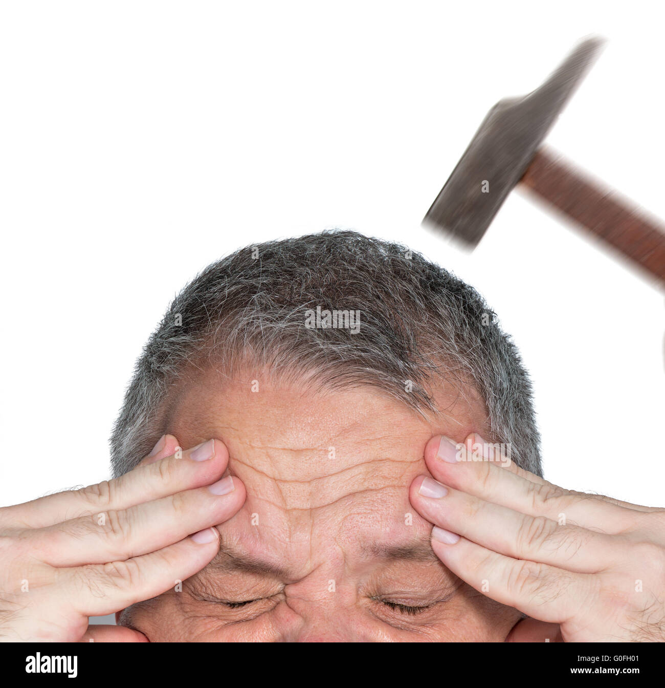 Man with hands on his forehead Stock Photo