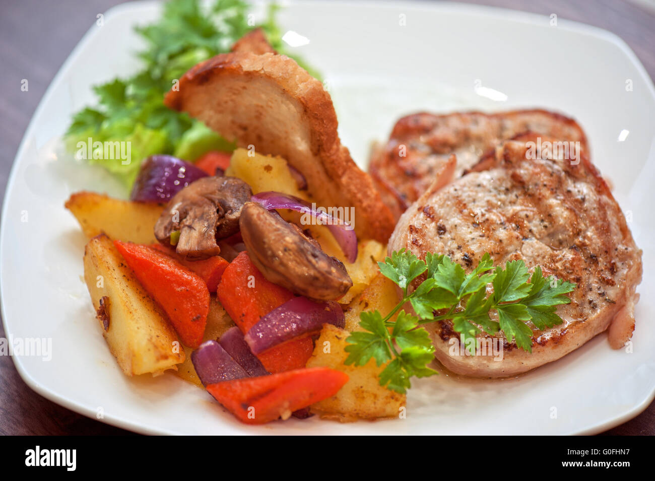 Pork chop with vegetable Stock Photo - Alamy