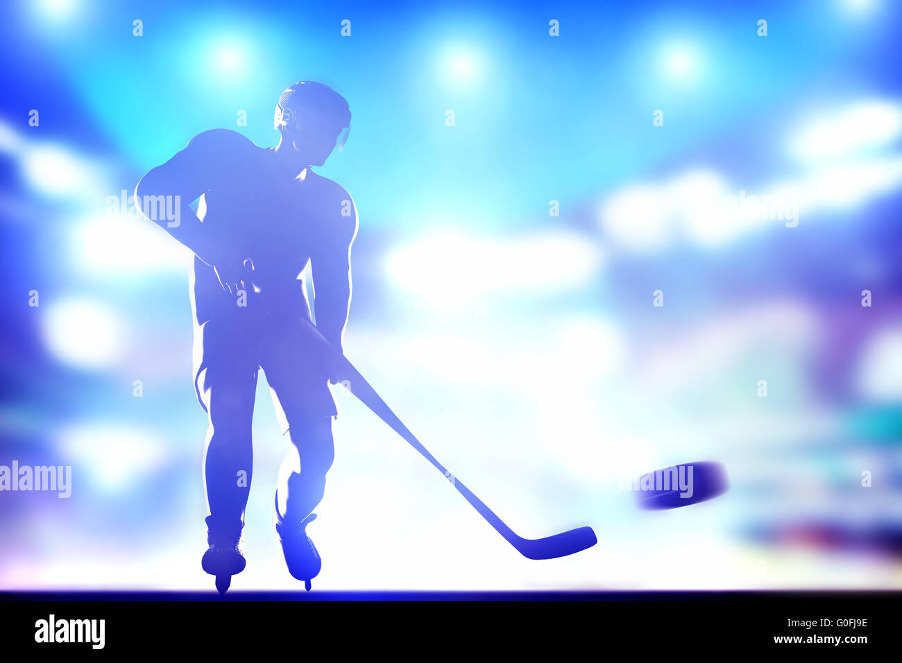 Hockey player shooting on goal in full arena night lights Stock Photo Alamy