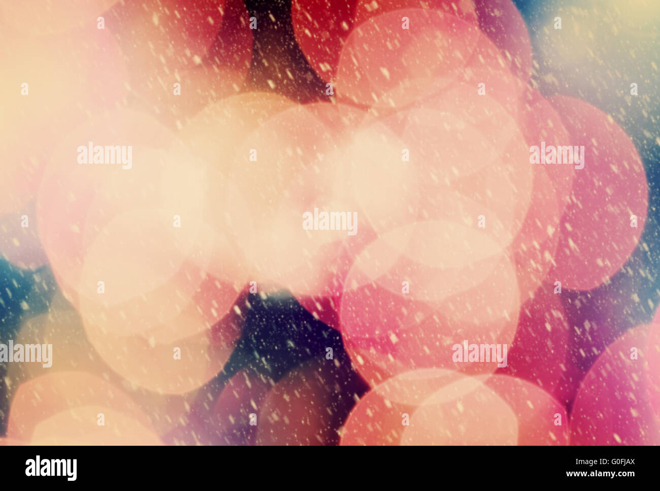 Christmas background of true camera bokeh. Snow blizzard texture. Glitter and light abstract. Stock Photo