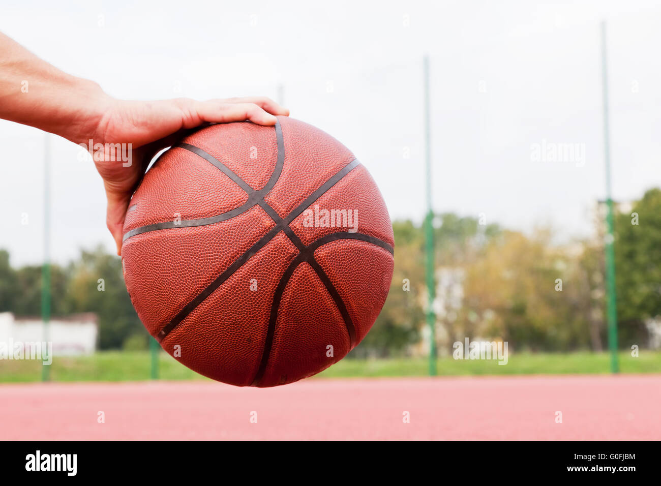 Dribbling the ball on basketball court. Streetball Stock Photo Alamy