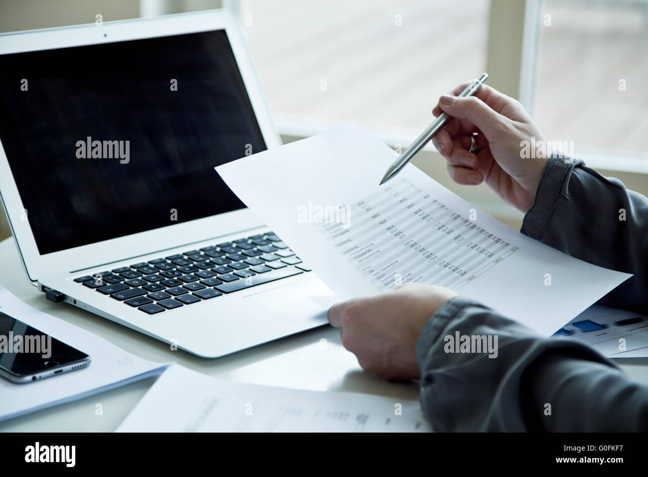 office work on notebook Stock Photo Alamy