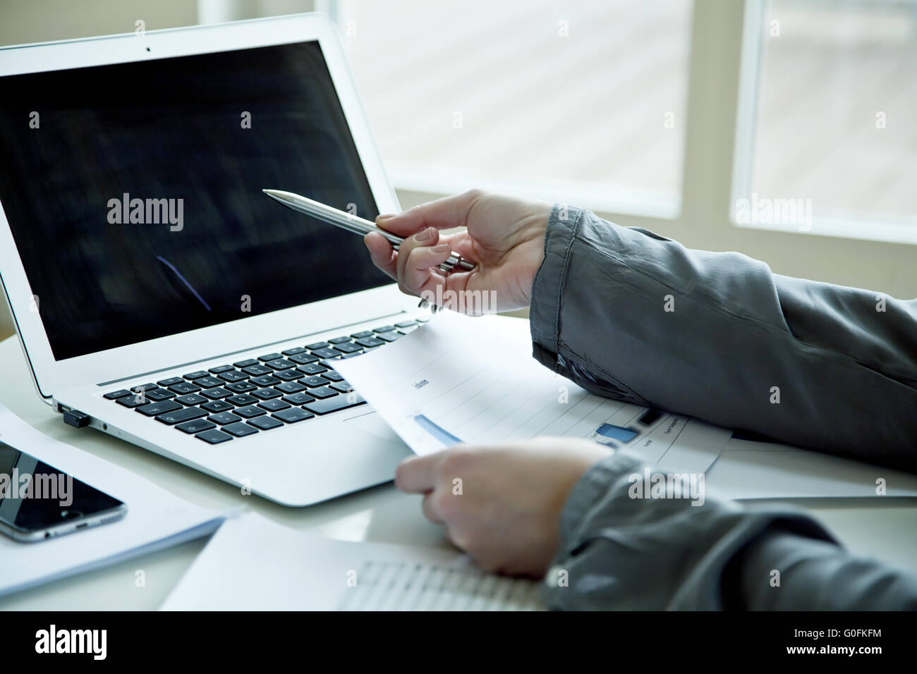 office work on notebook Stock Photo Alamy