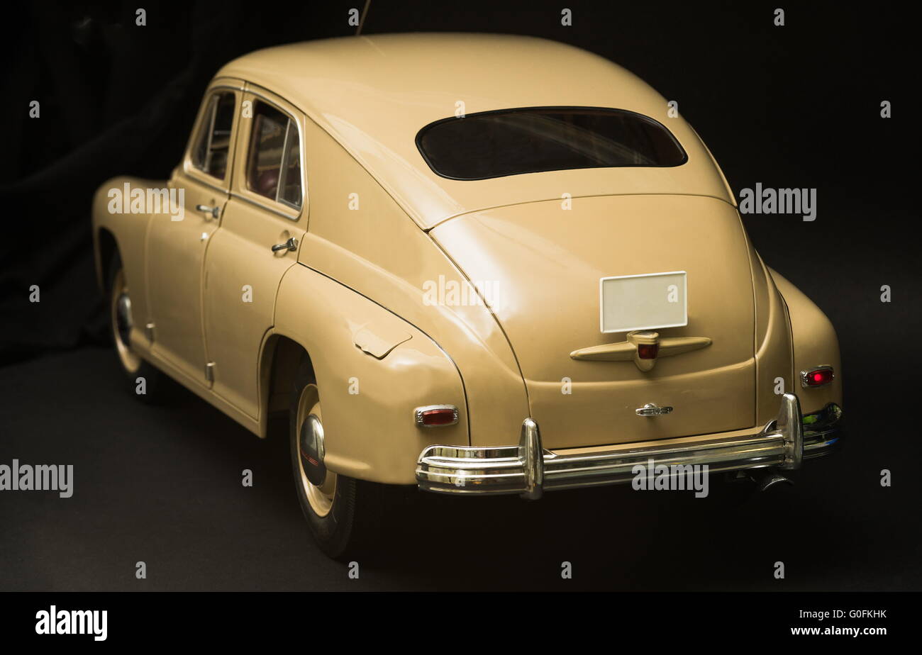 Retro Rear View End Rear view of retro car on a black background Stock Photo - Alamy