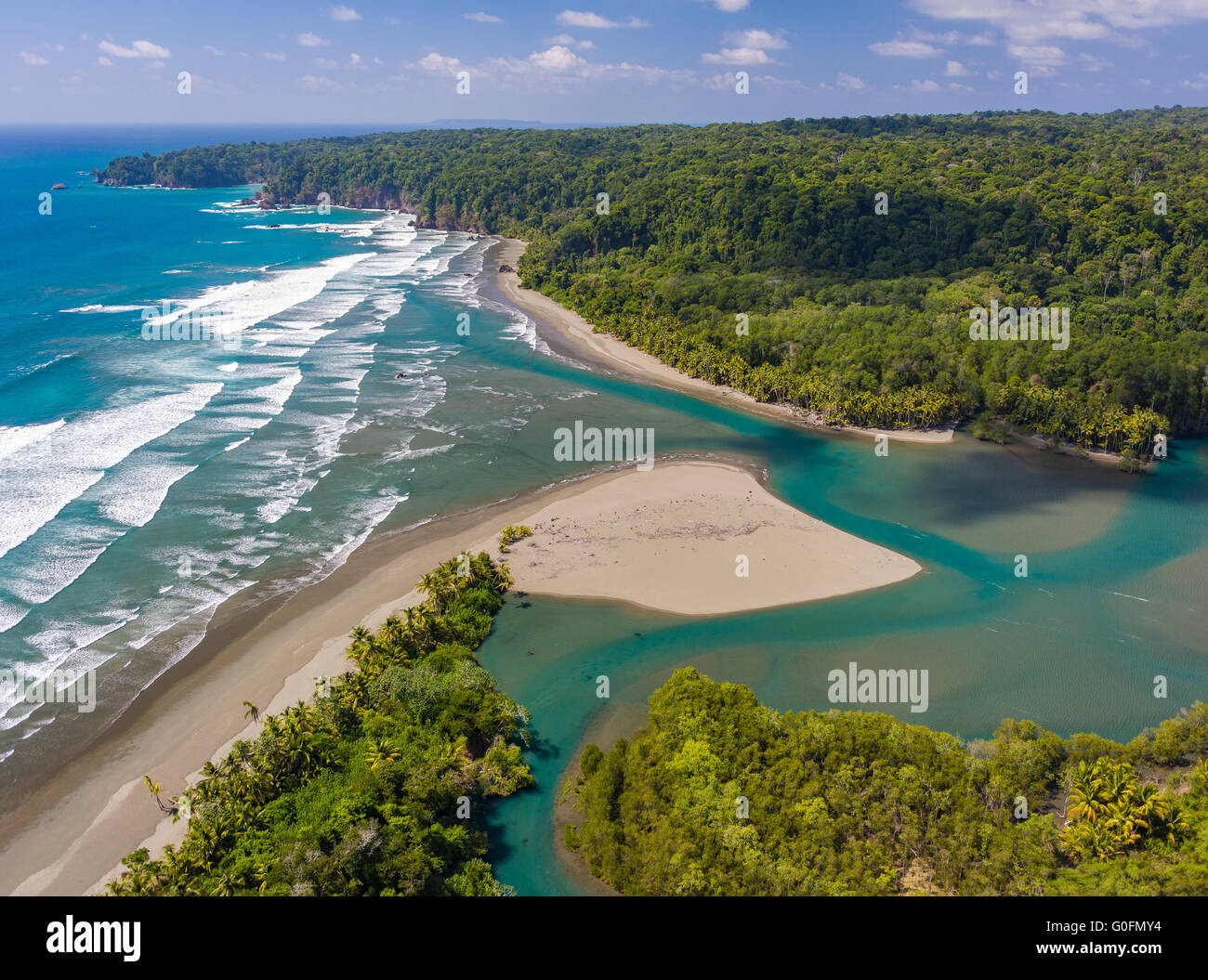 CORCOVADO NATIONAL PARK, COSTA RICA - Rio Claro empties into Pacific Ocean, Osa Peninsula rain forest. Stock Photo