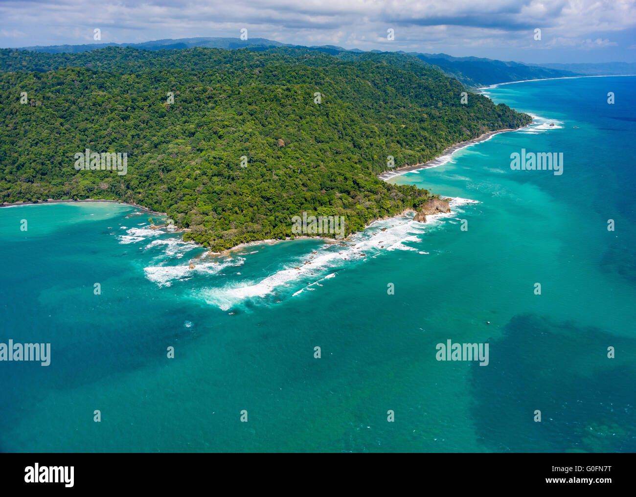 CORCOVADO NATIONAL PARK, COSTA RICA - Aerial of Osa Peninsula rain forest and the Pacific Ocean coast. Stock Photo