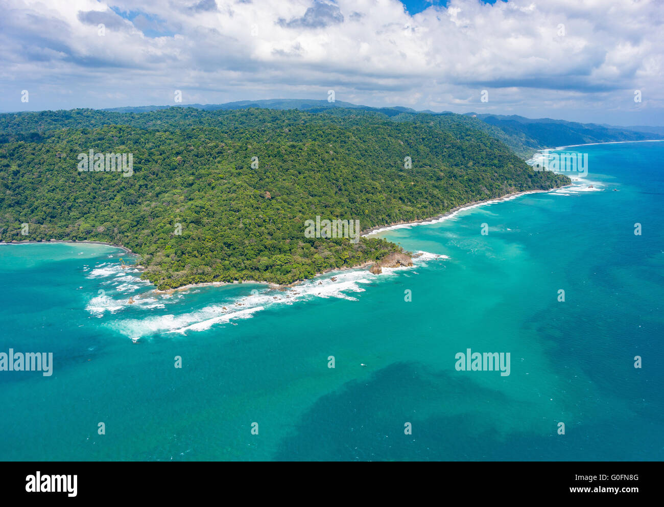 CORCOVADO NATIONAL PARK, COSTA RICA - Aerial of Osa Peninsula rain forest and the Pacific Ocean coast. Stock Photo