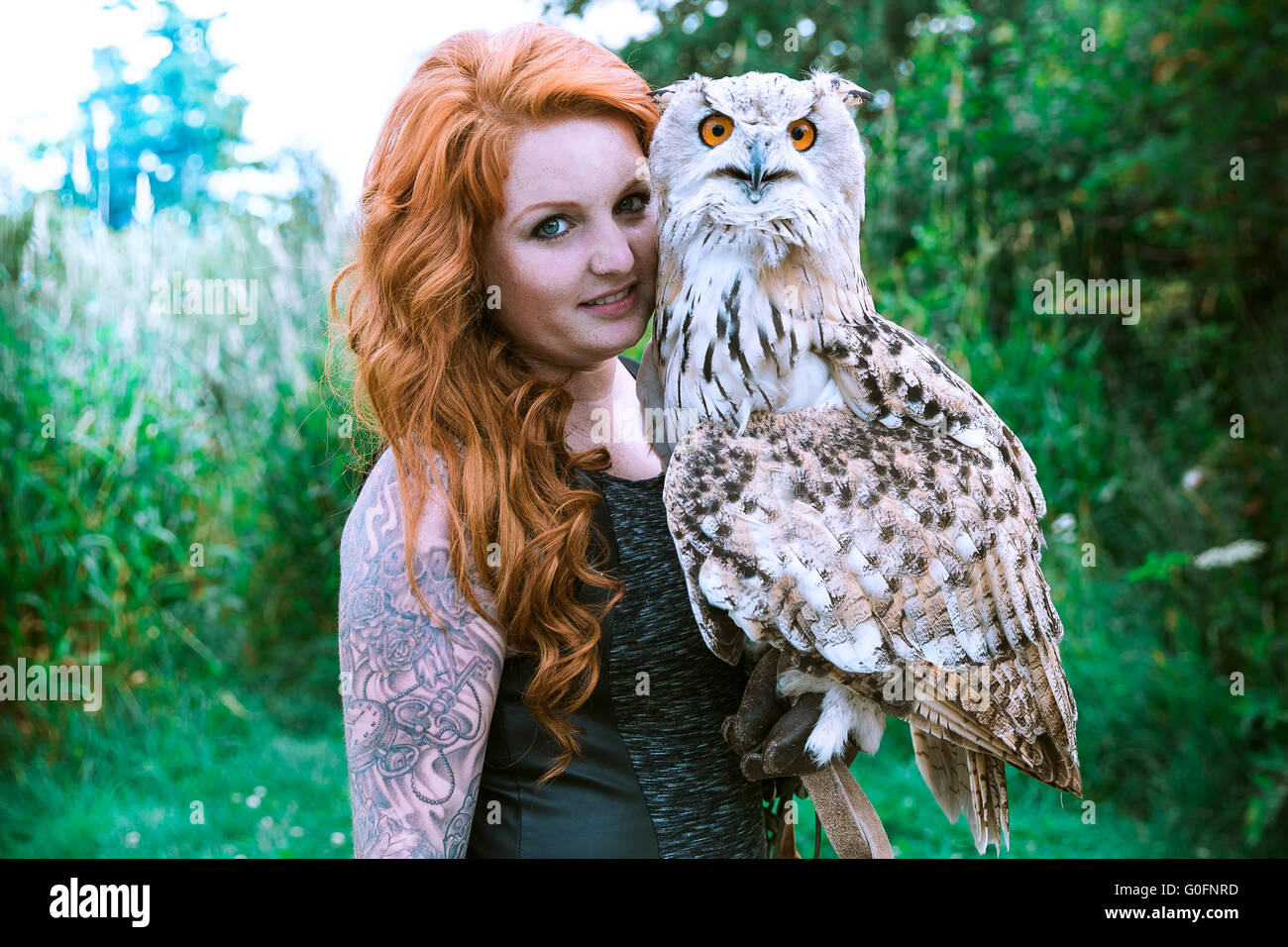 the owl with the lady Stock Photo