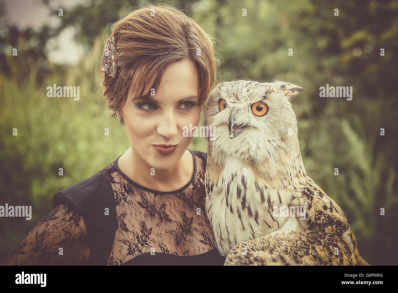 The owl with the Lady Stock Photo