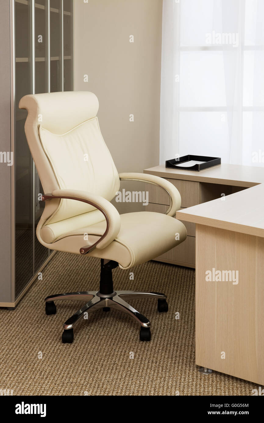 white leather armchair in a modern office Stock Photo Alamy
