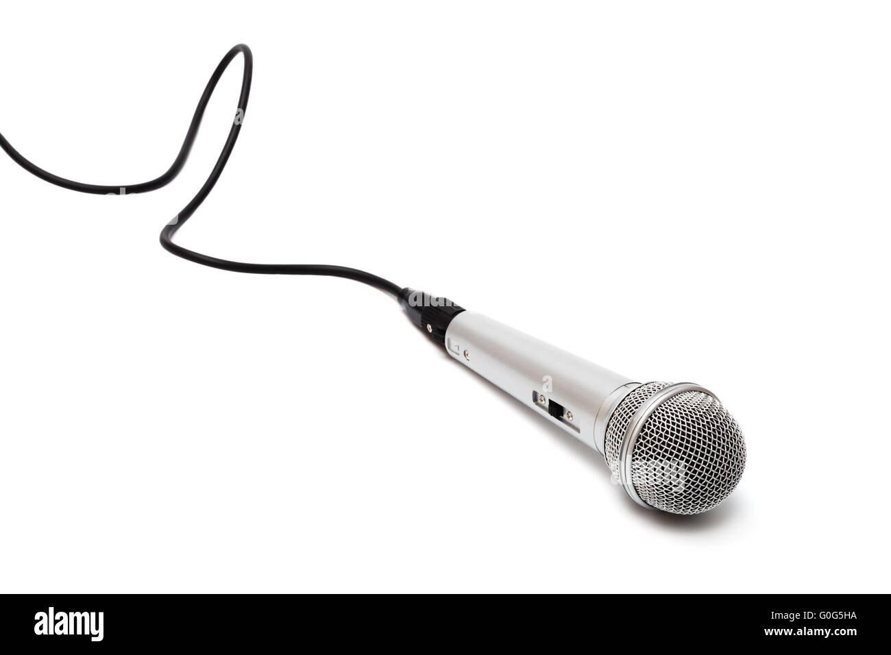 Microphone with a black cord on a white background Stock Photo