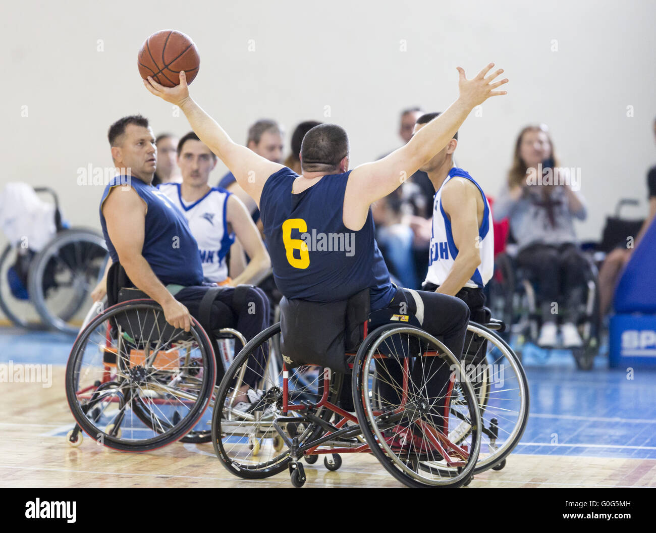Basketball in wheelchairs for physically disabled players Stock Photo