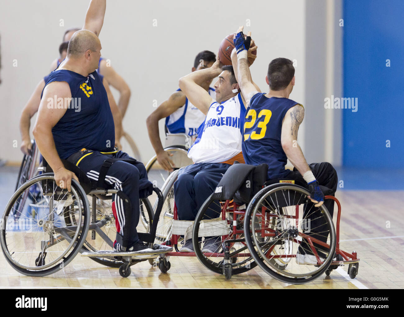 Basketball in wheelchairs for physically disabled players Stock Photo
