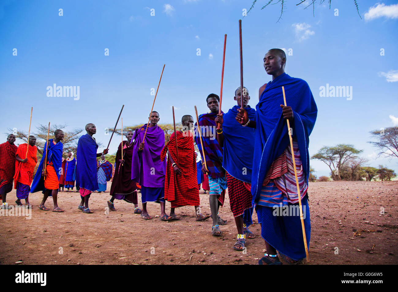 Maasai men in their ritual dance in their village in Tanzania, Africa Stock Photo