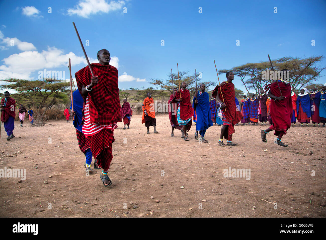 Maasai men in their ritual dance in their village in Tanzania, Africa Stock Photo