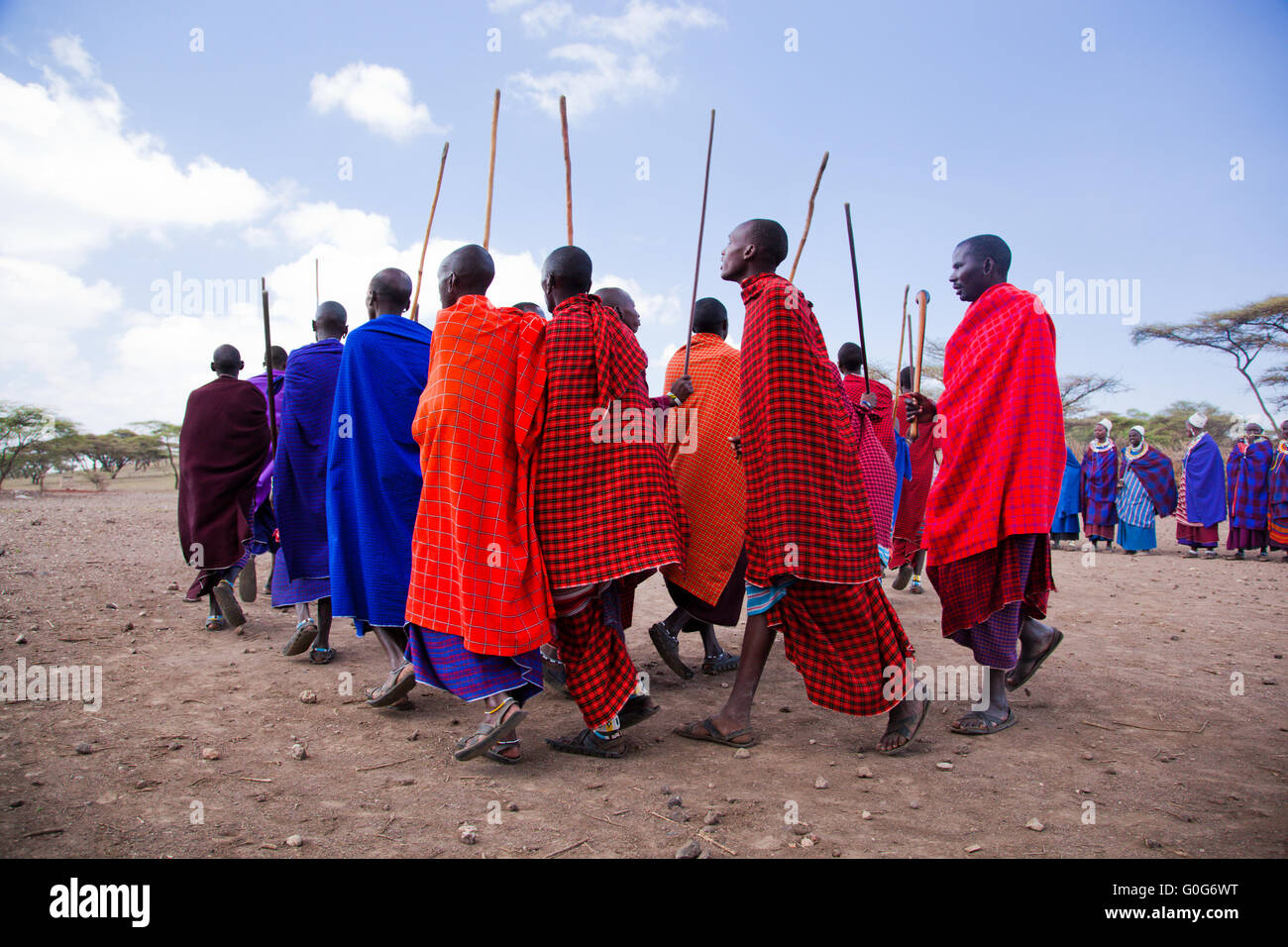 Maasai men in their ritual dance in their village in Tanzania, Africa Stock Photo
