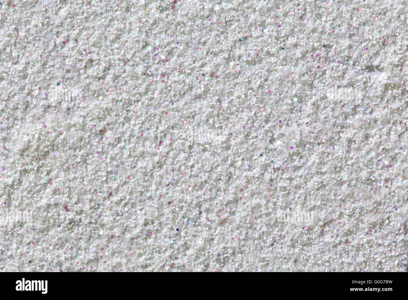 White wall background with colorful spots. A high resolution macro photograph Stock Photo
