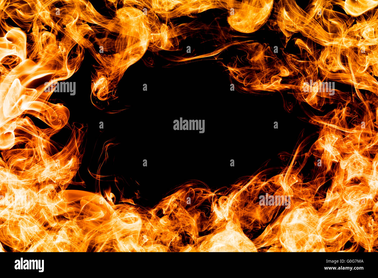 Fire flames on black background making a frame Stock Photo - Alamy