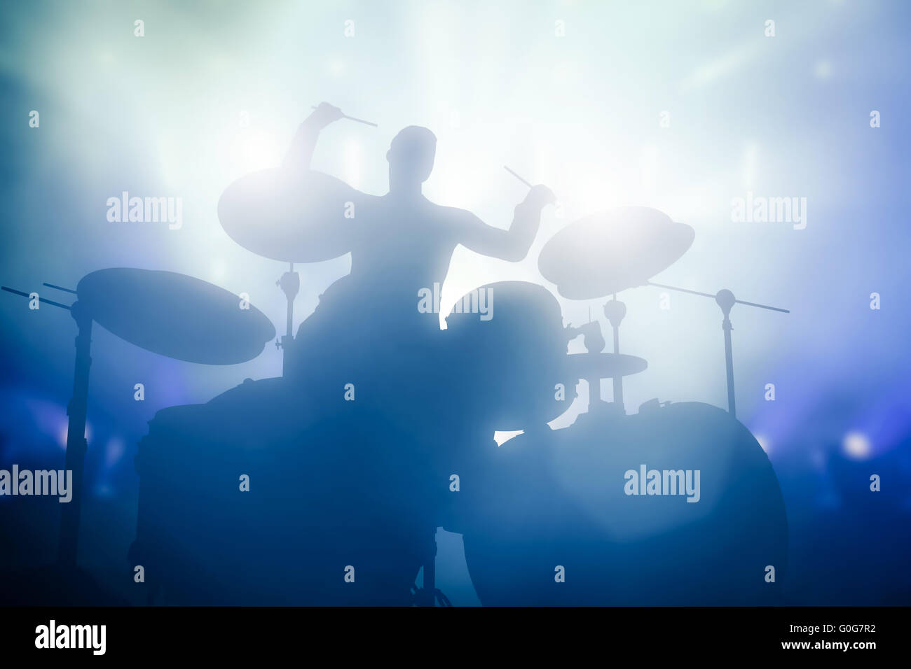 Drummer playing on drums on music concert. Club lights Stock Photo Alamy