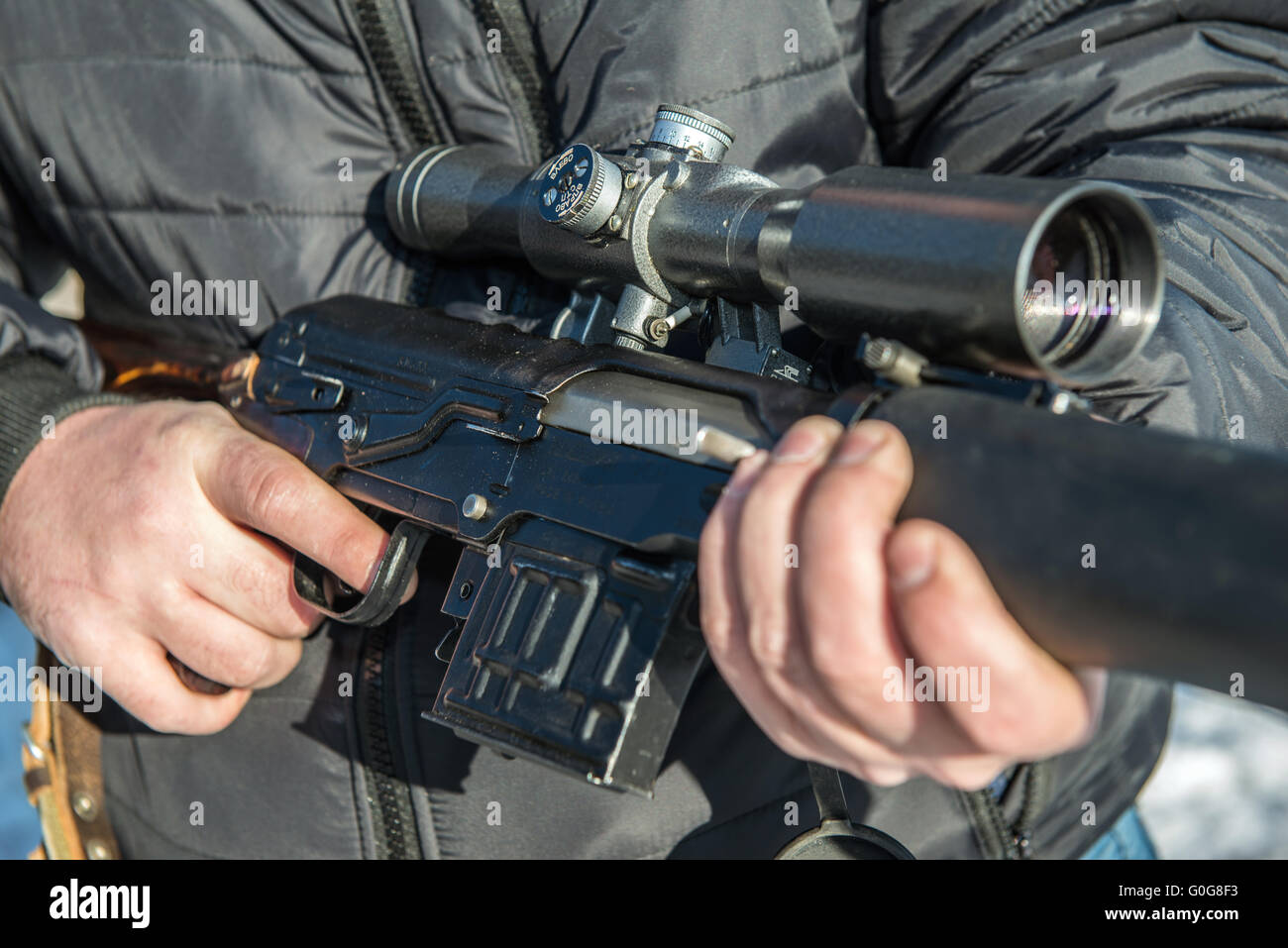 soldier or sniper holding gun with virtual screen projection and aiming ...