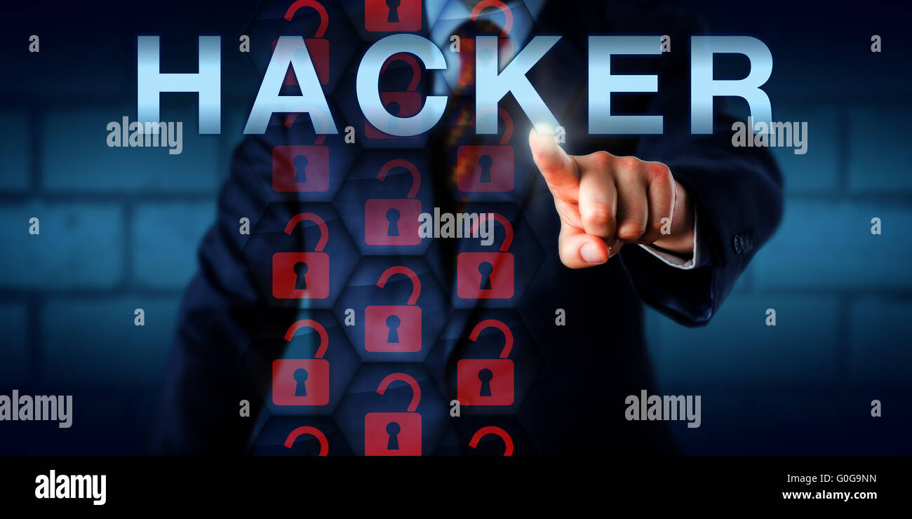 Security Expert Touching HACKER Onscreen Stock Photo