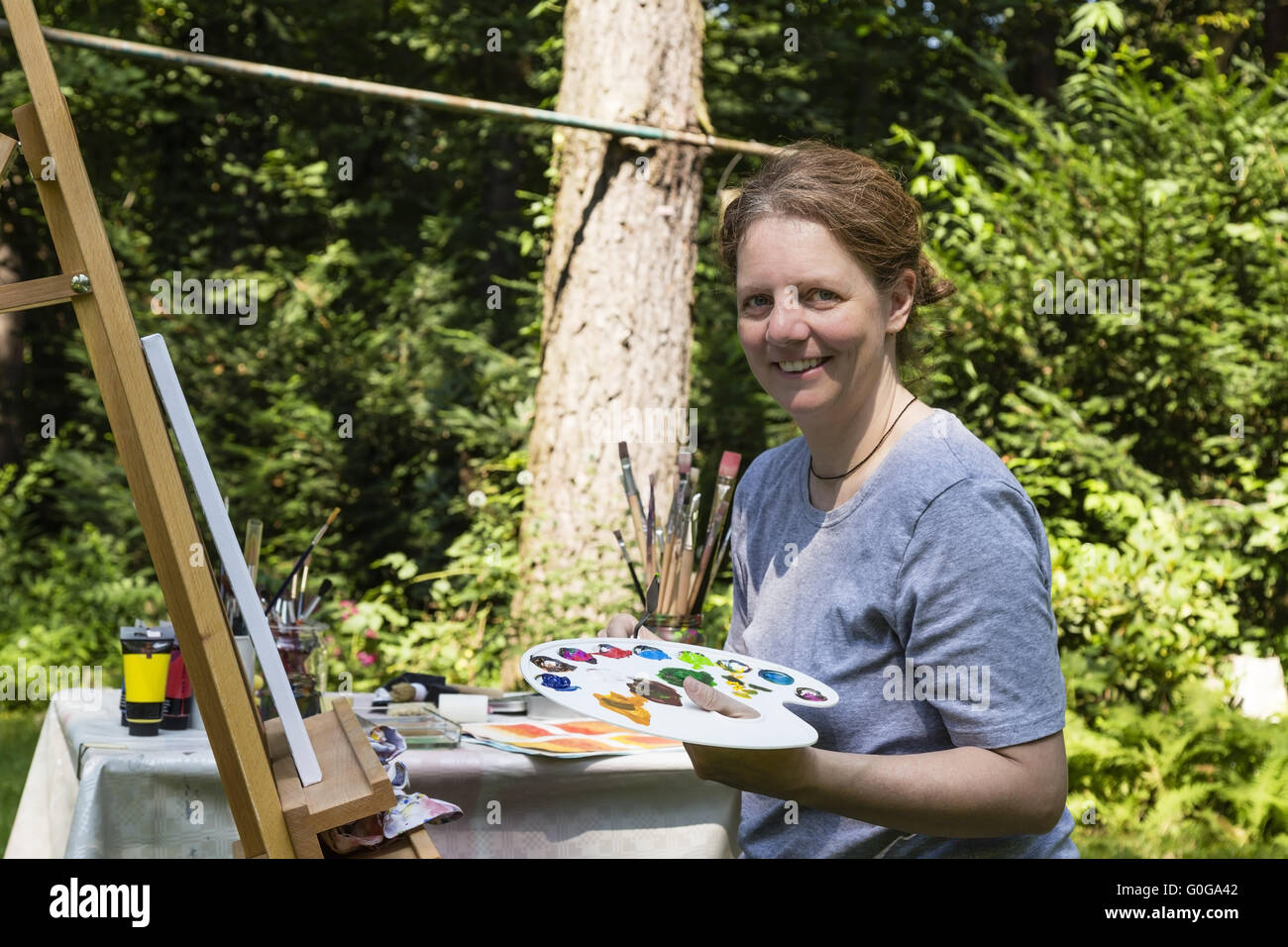 woman is painting Stock Photo