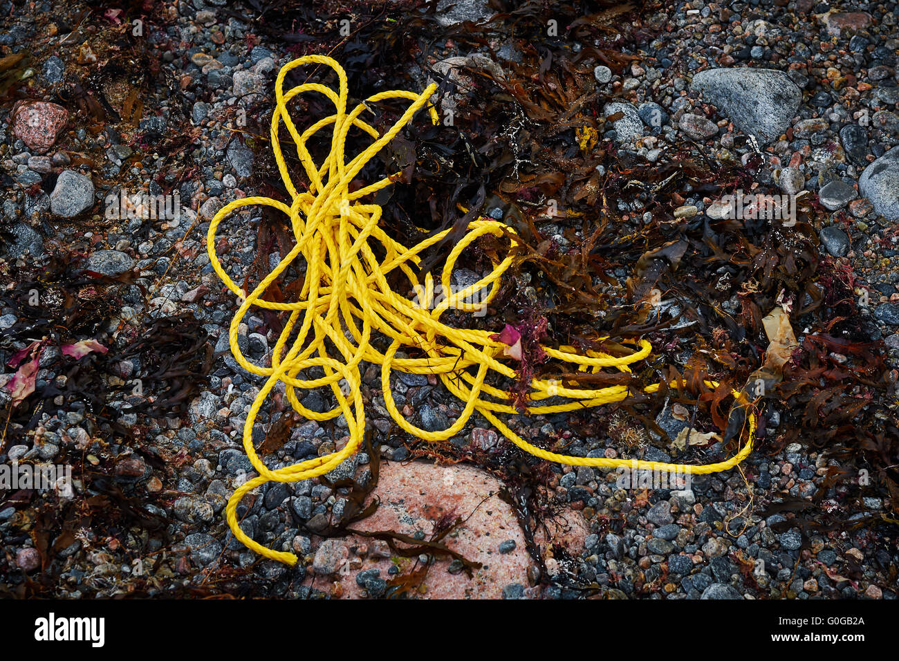 Flotsam: Yellow Rope Stock Photo