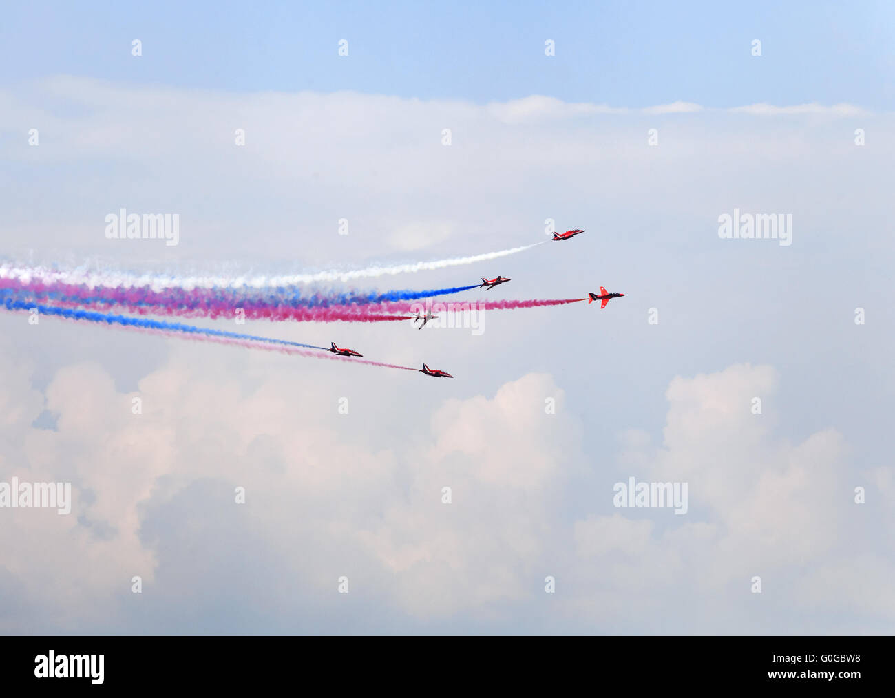 Planes on an air show against cloudy sky Stock Photo - Alamy