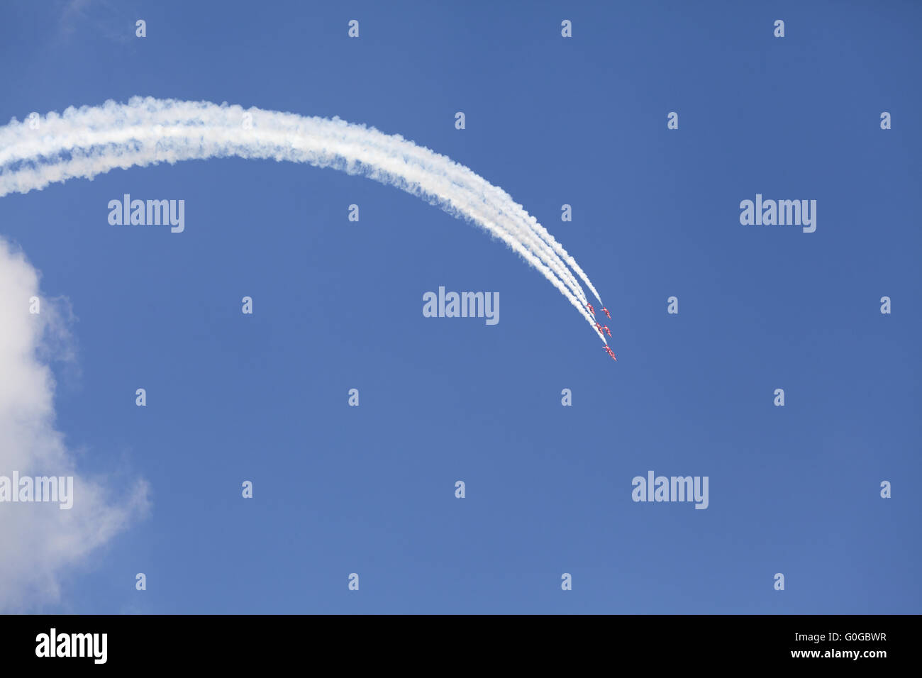 Plane on an air show against blue sky Stock Photo - Alamy