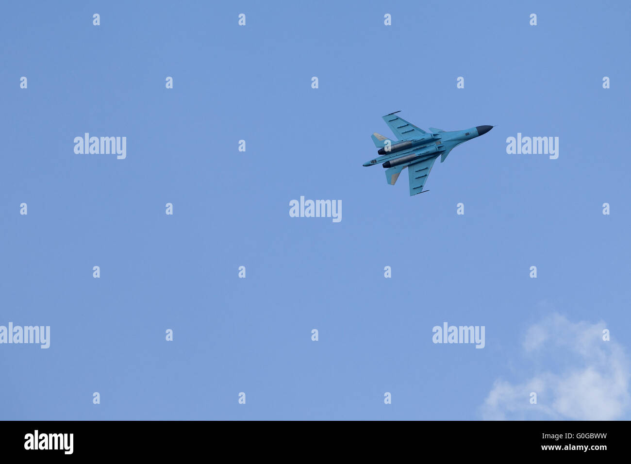 Plane on an air show against blue sky Stock Photo - Alamy