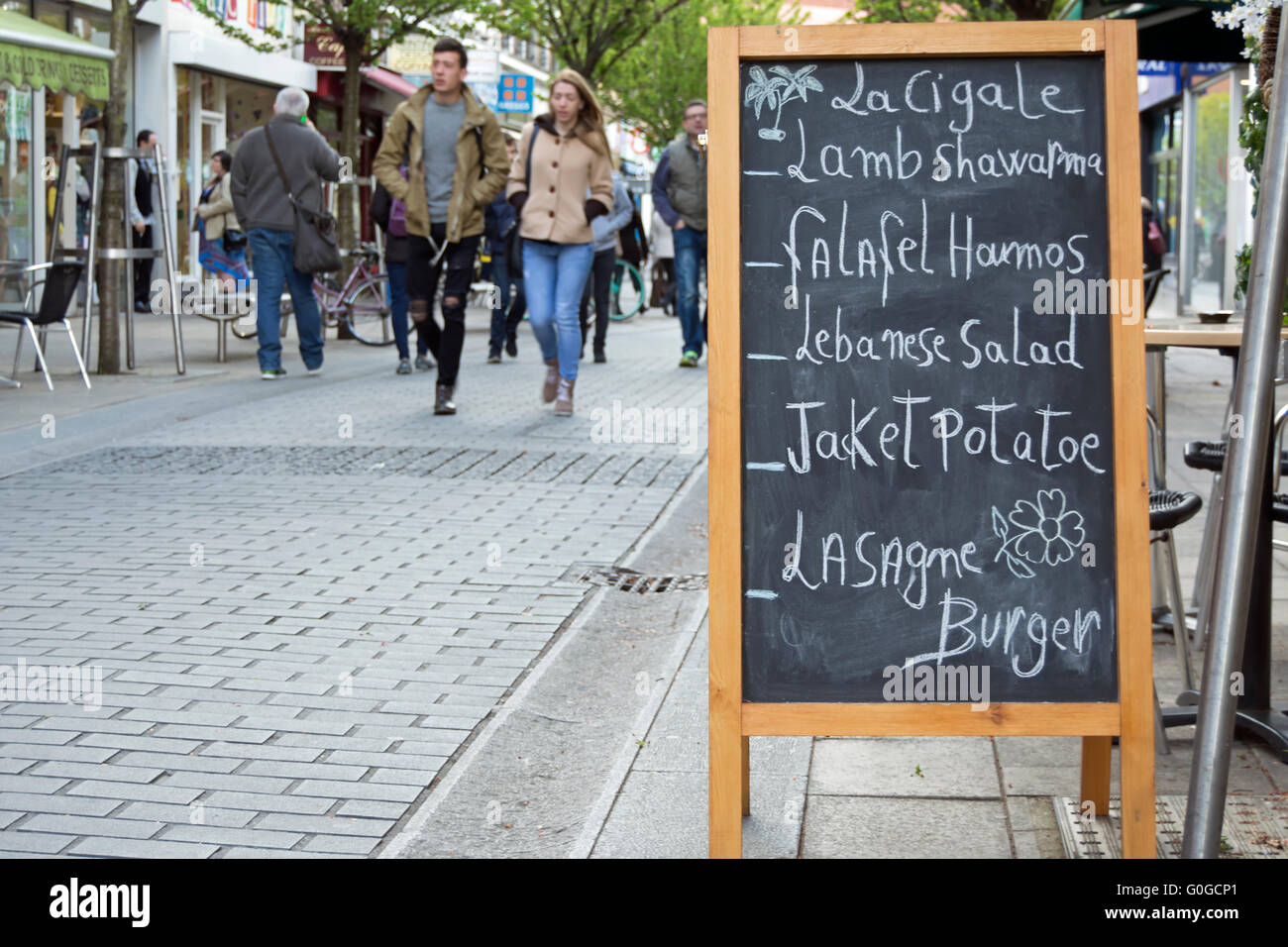 blackboard menu outside a cafe in kingston upon thames, surrey, england, with the word potato misspelt Stock Photo