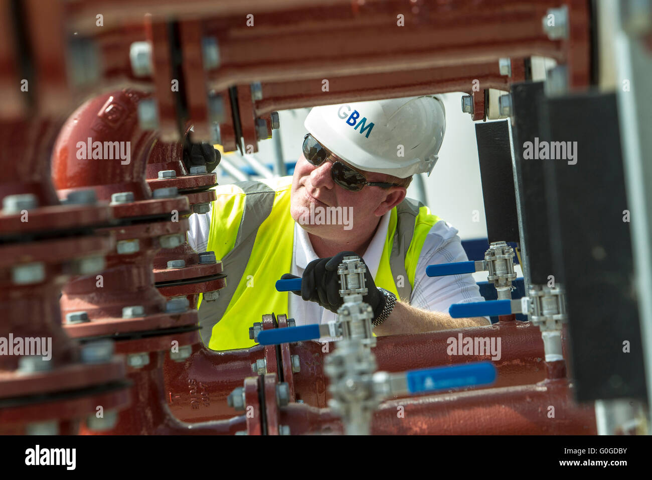 pipes and valves in waste water treatment plant London Stock Photo