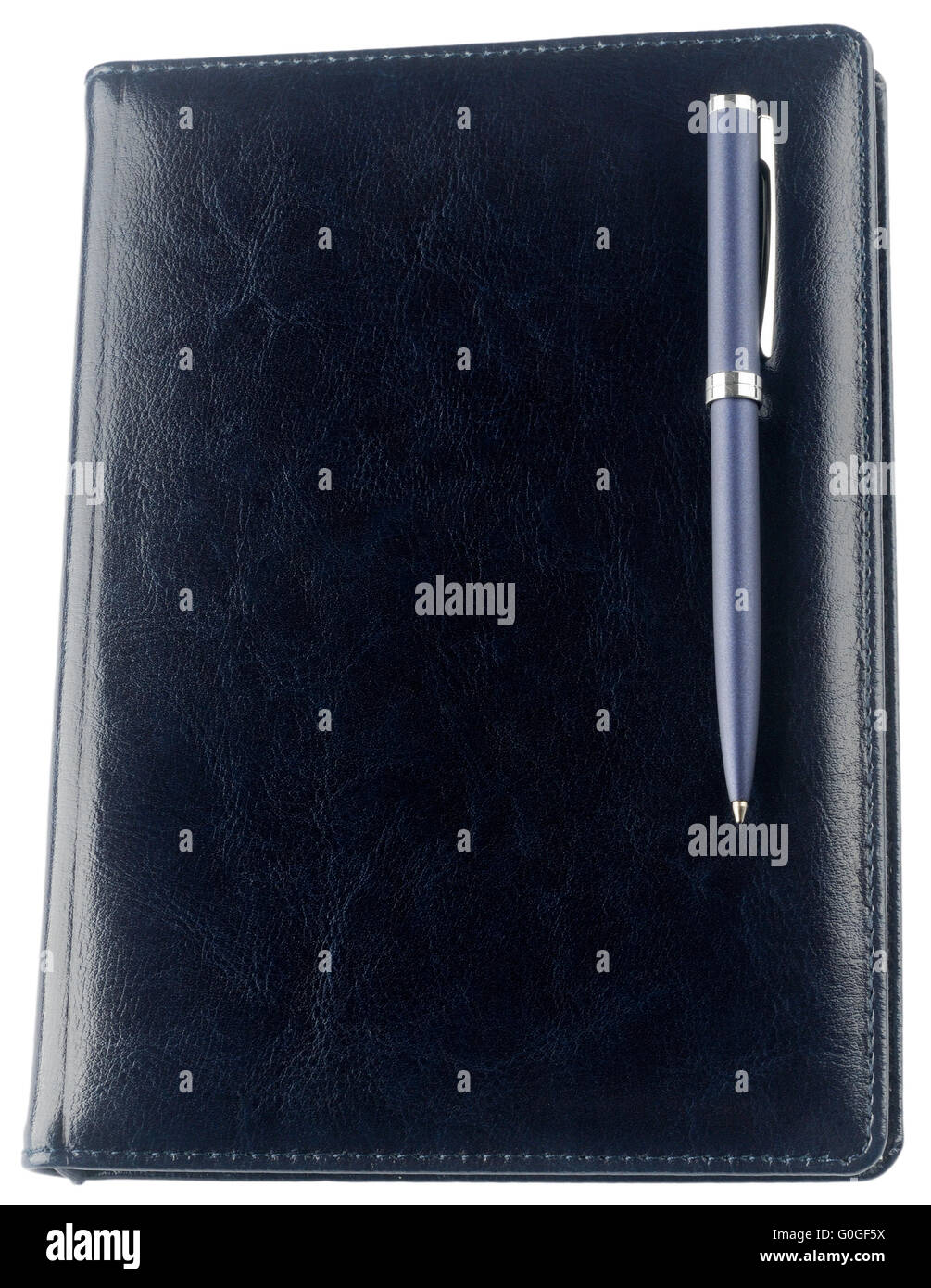 Dark blue paper personal organizer and ball-point pen isolated on white Stock Photo