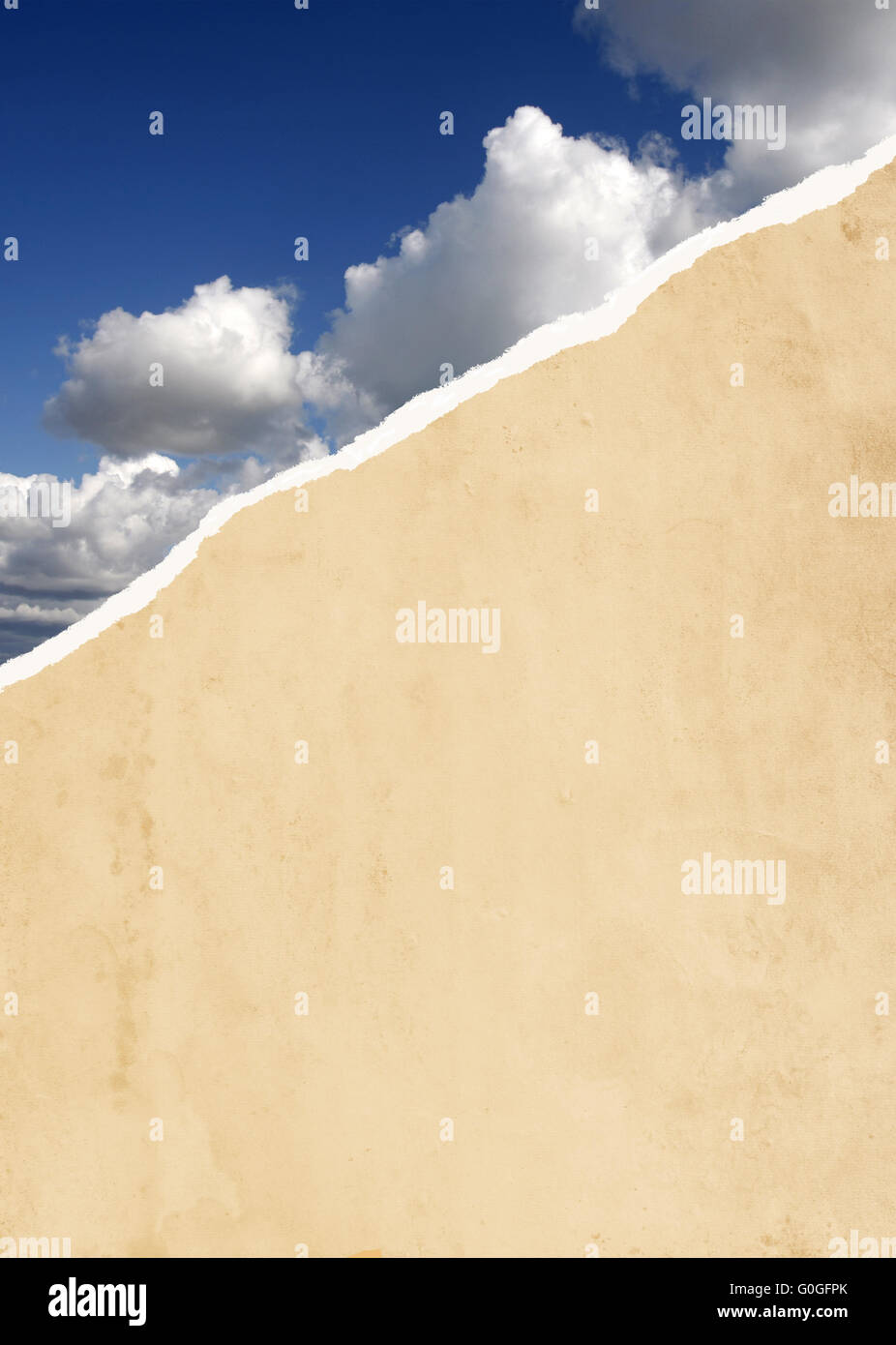 Ripped paper with clouds Stock Photo - Alamy