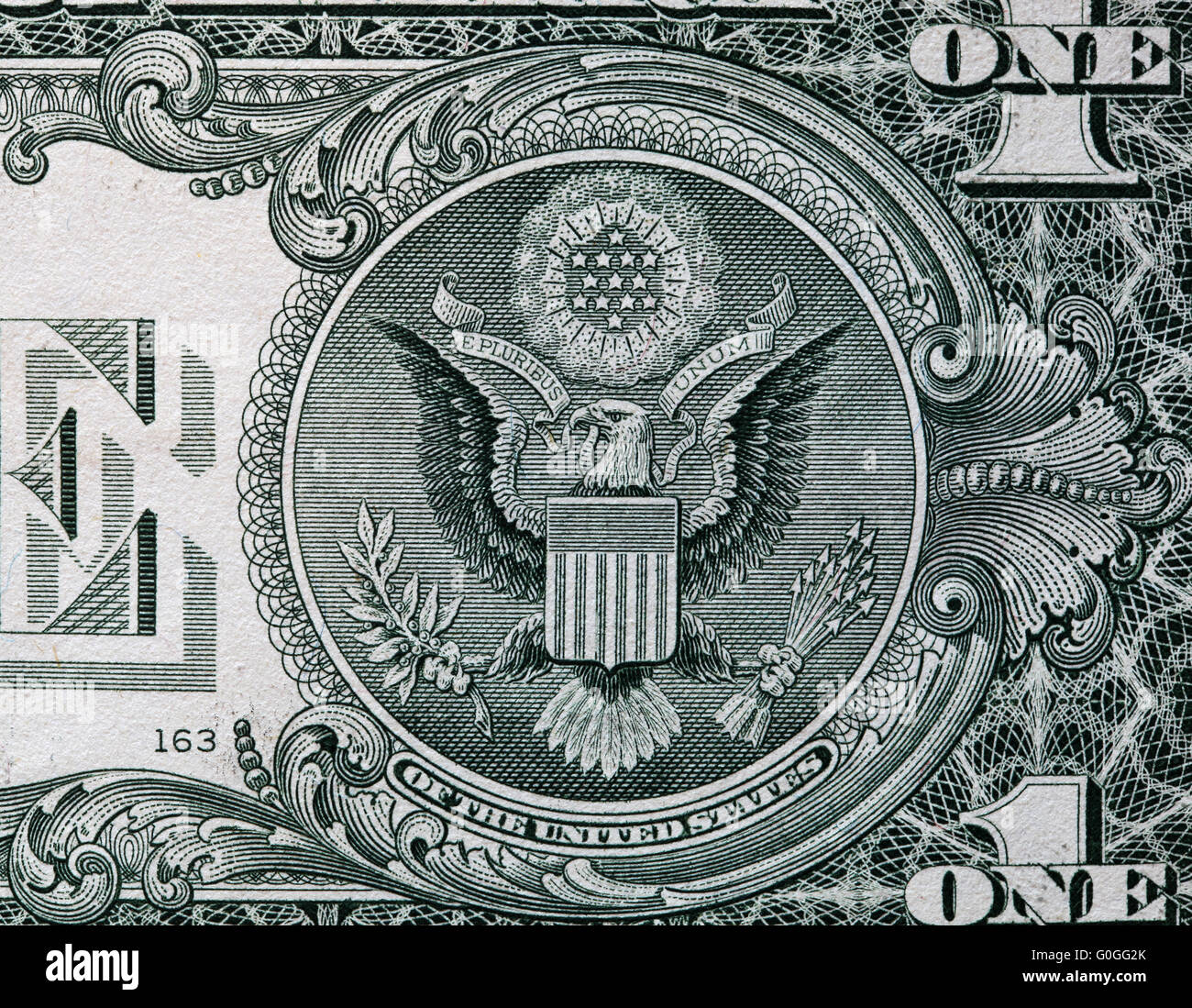 The Seal of The United States with E Pluribus Unum motto on the reverse side of one American dollar bill. USD Stock Photo