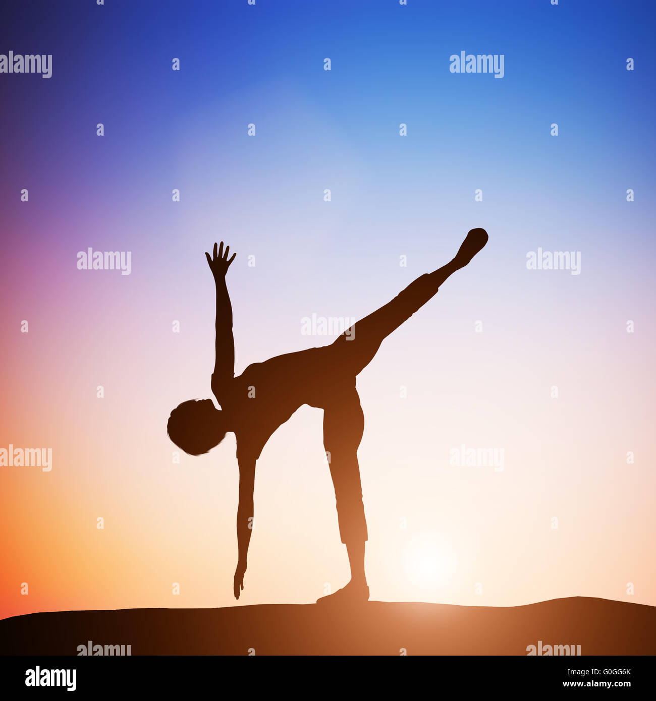 Woman in half moon yoga pose meditating at sunset. Zen Stock Photo