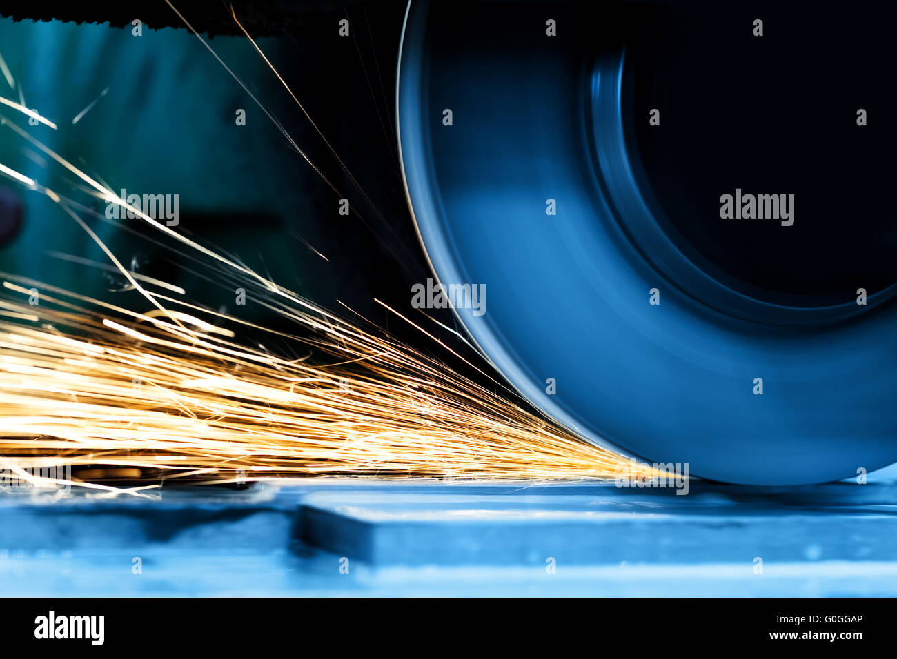 Sparks from grinding machine. Industrial, industry Stock Photo