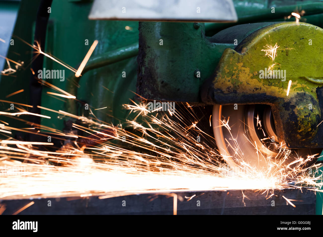 Sparks from grinding machine. Industrial, industry Stock Photo