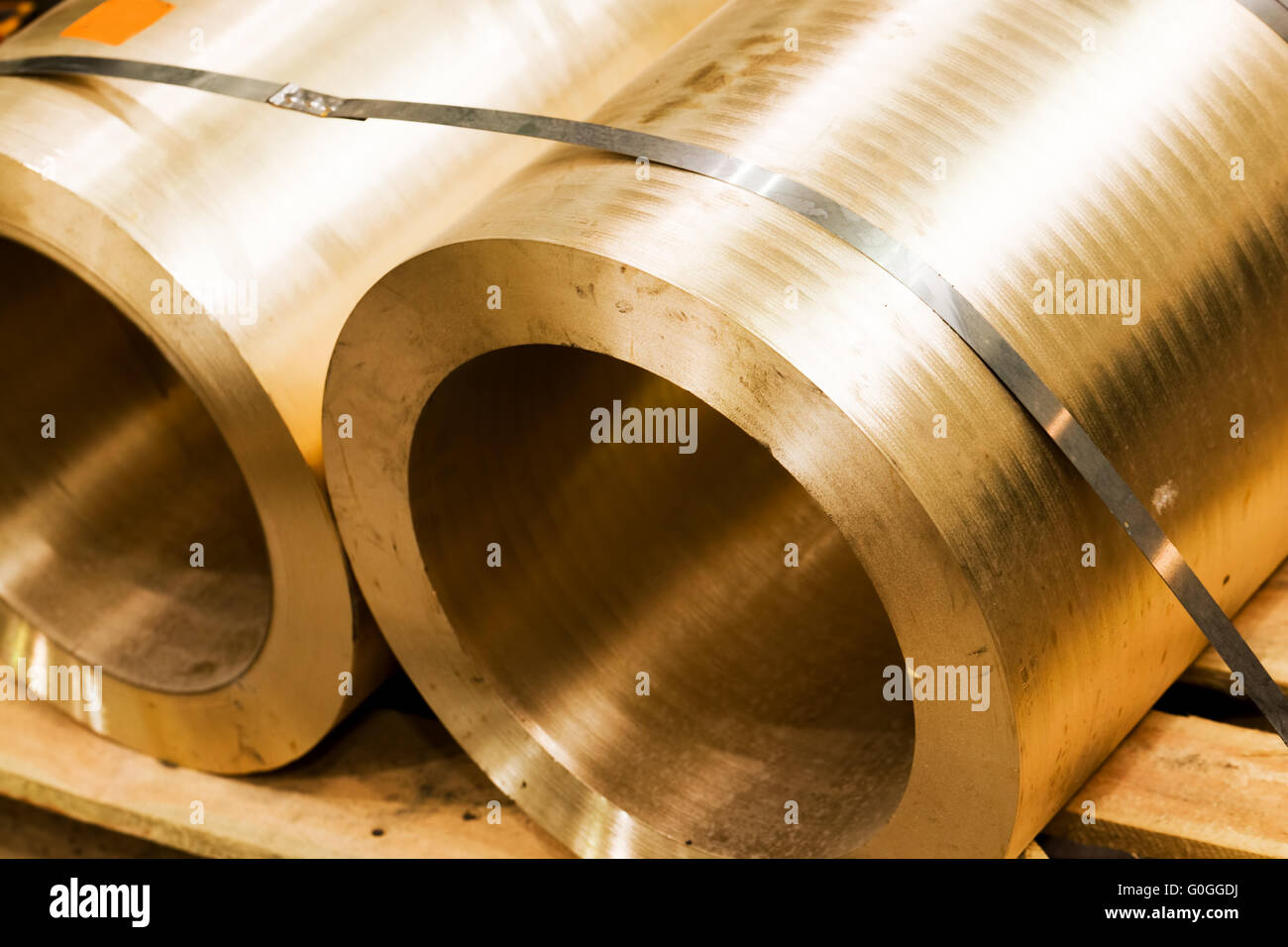 Industrial hardened steel cylinders in workshop. Industry. Stock Photo