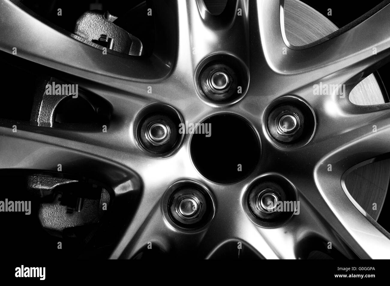Close-up of aluminium rim of luxury car wheel Stock Photo