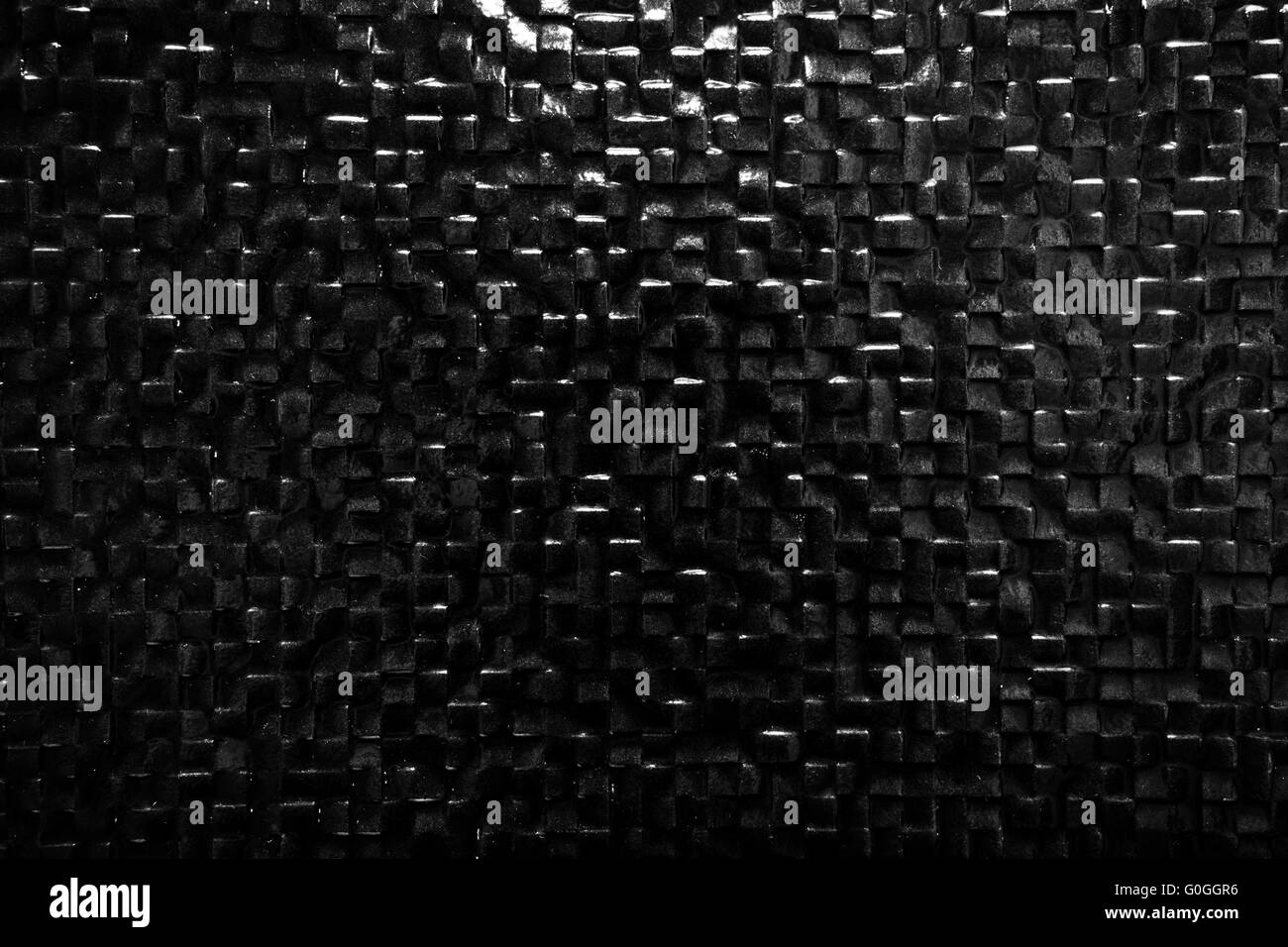 Black tile wall background reflecting light. Elegant pattern Stock Photo