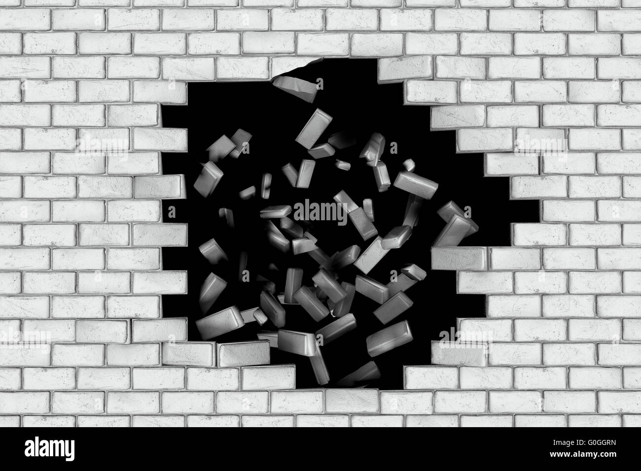 White brick wall falling down making a hole. Black background Stock Photo