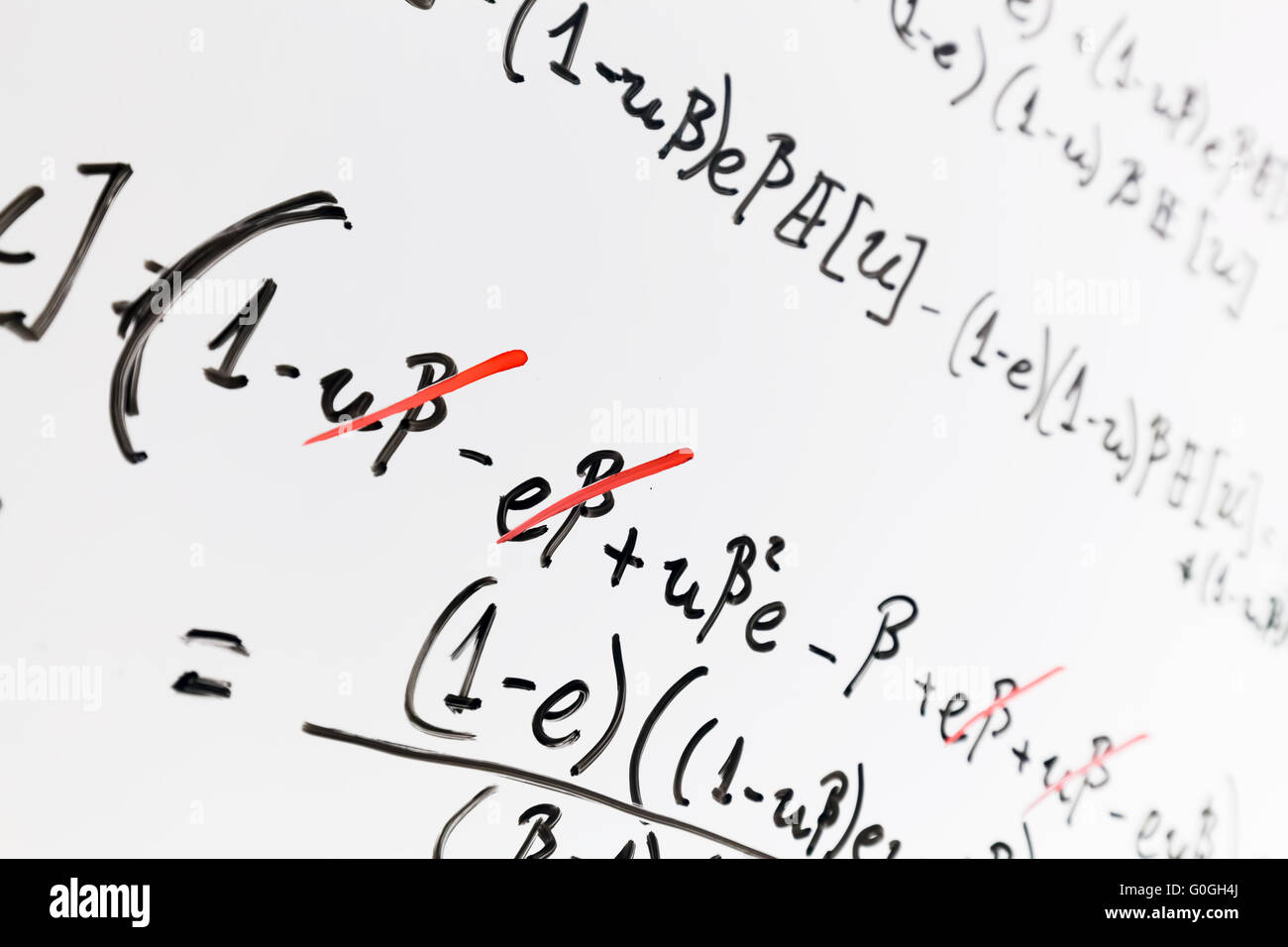 Complex math formulas on whiteboard. Mathematics and science with economics Stock Photo