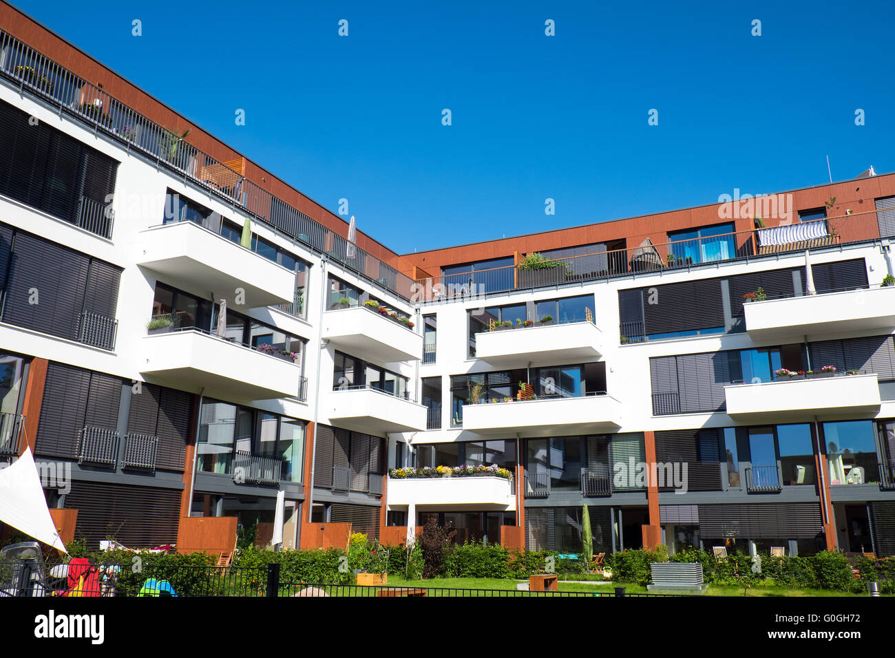 Modern apartments with garden seen in Berlin, Germany Stock Photo