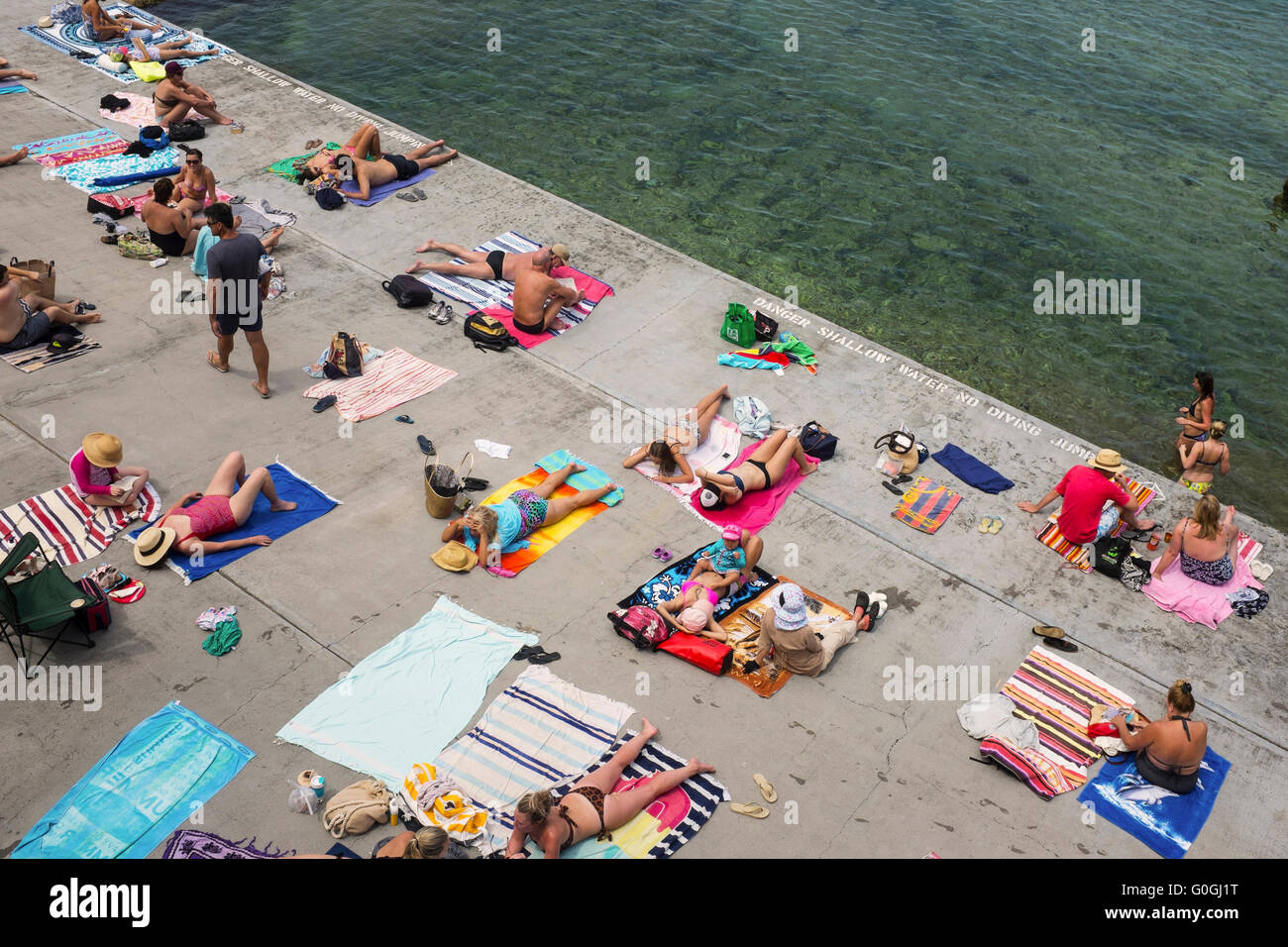 aerial view of sunbathers at Wylie Baths in Sydney, New South Wales, Australia Stock Photo
