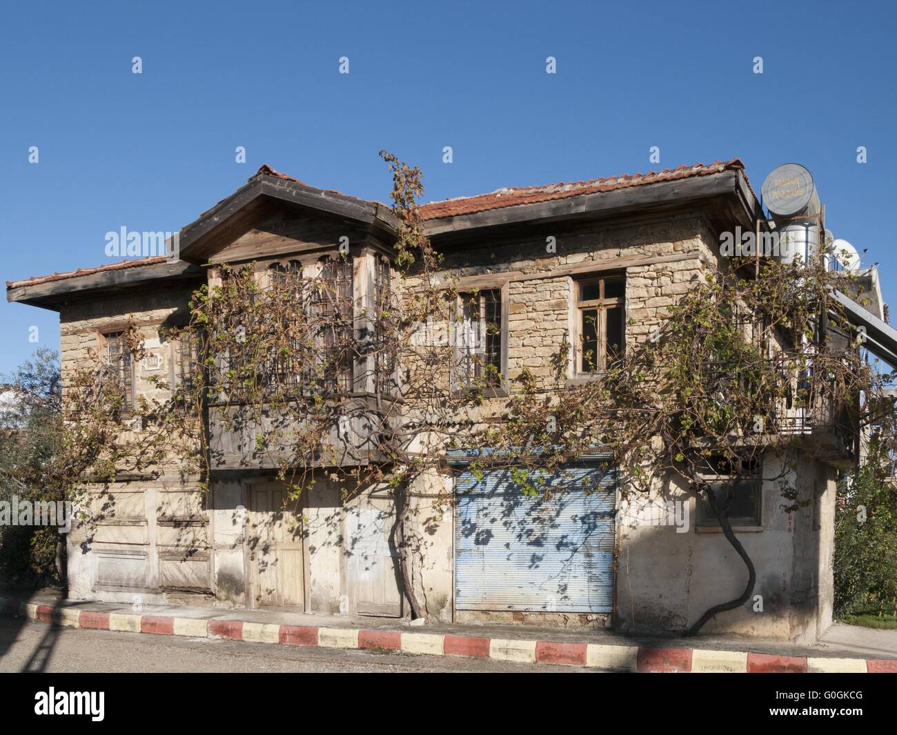 Old House in Tasagil with the typical Wooden bay Stock Photo