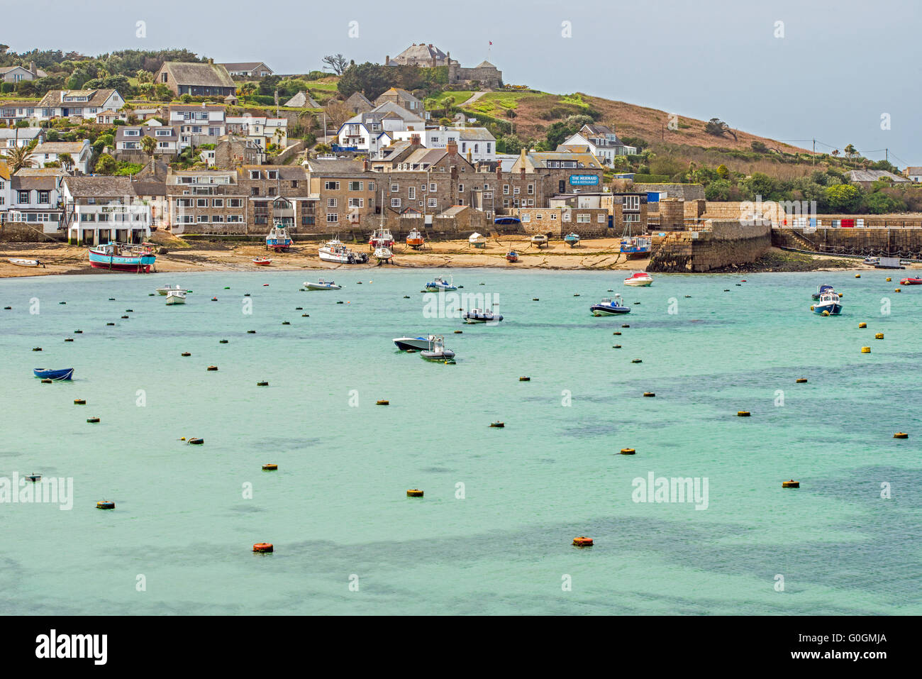 Hugh Town on St Marys on the Isles of Scilly showing the bay and boat moorings Stock Photo