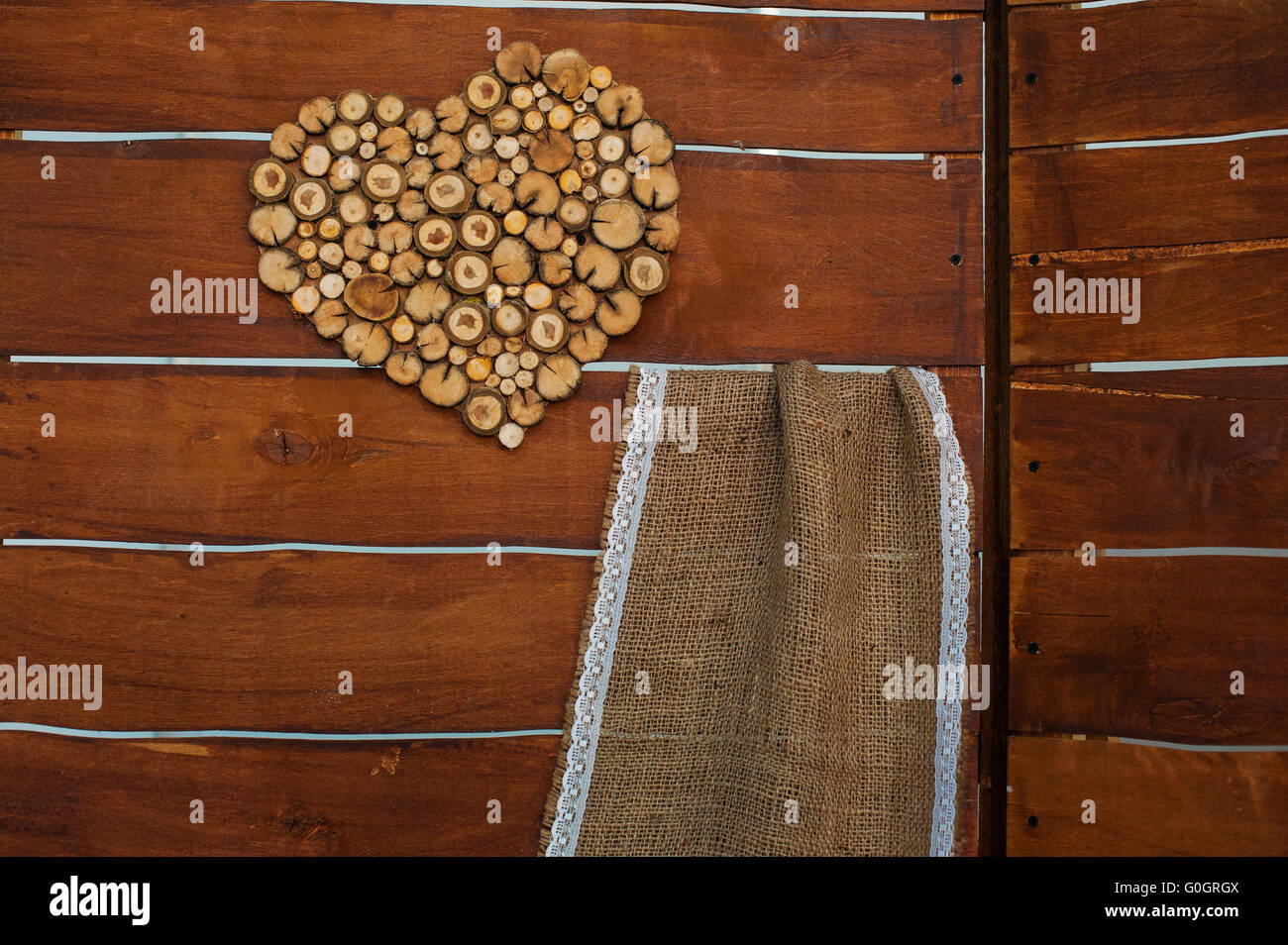 Original wedding decoration in form of wooden heart for ceremony Stock Photo