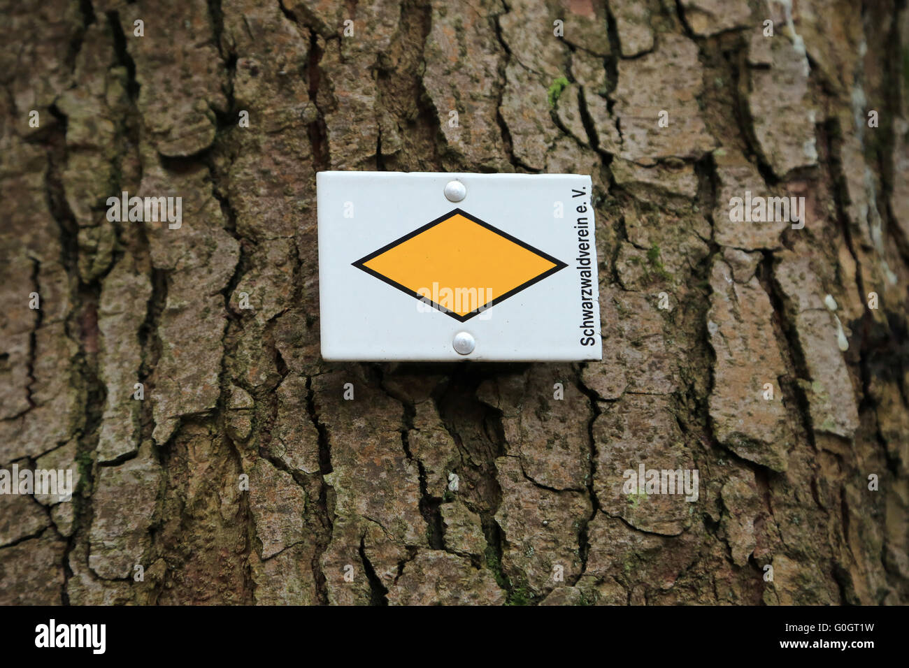 Rhombic direction sign of a hiking trail in the Black Forest Stock Photo