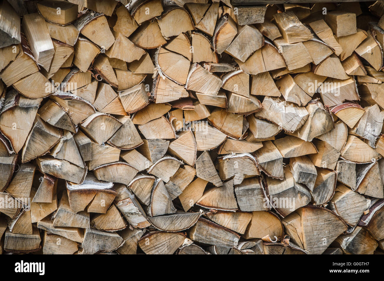 folded rows of firewood, close-up Stock Photo